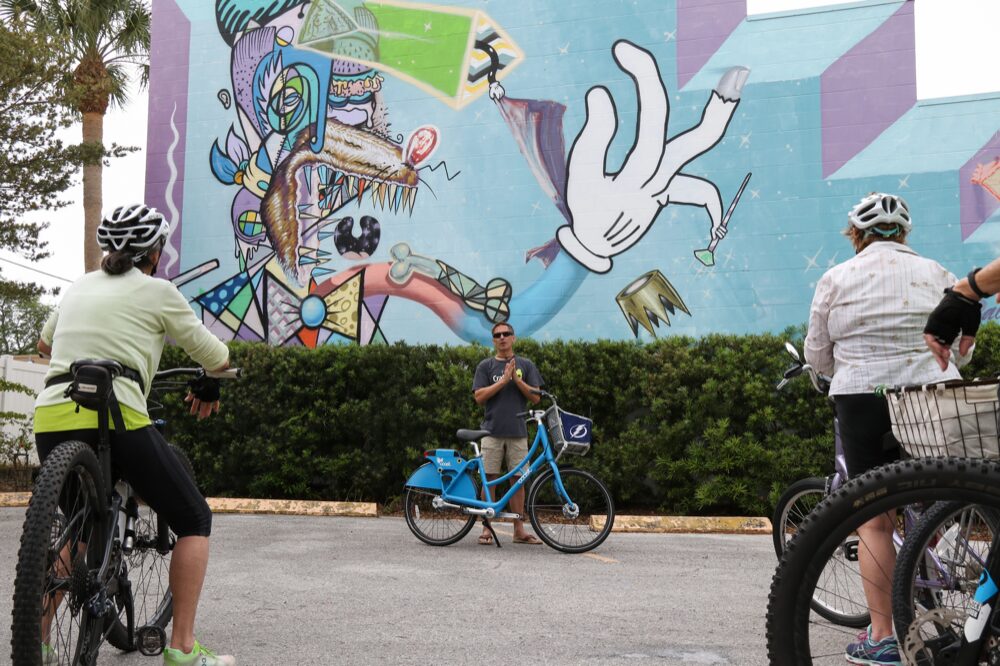 Bike tour guided by Greg Stanek Mural by Sebastian Coolidge Located at 694 Arlington North.