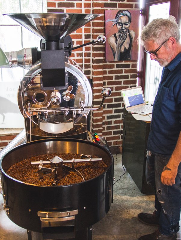 Black Crow Coffee Co-Owner Greg Bauman overseeing the coffee roasting process