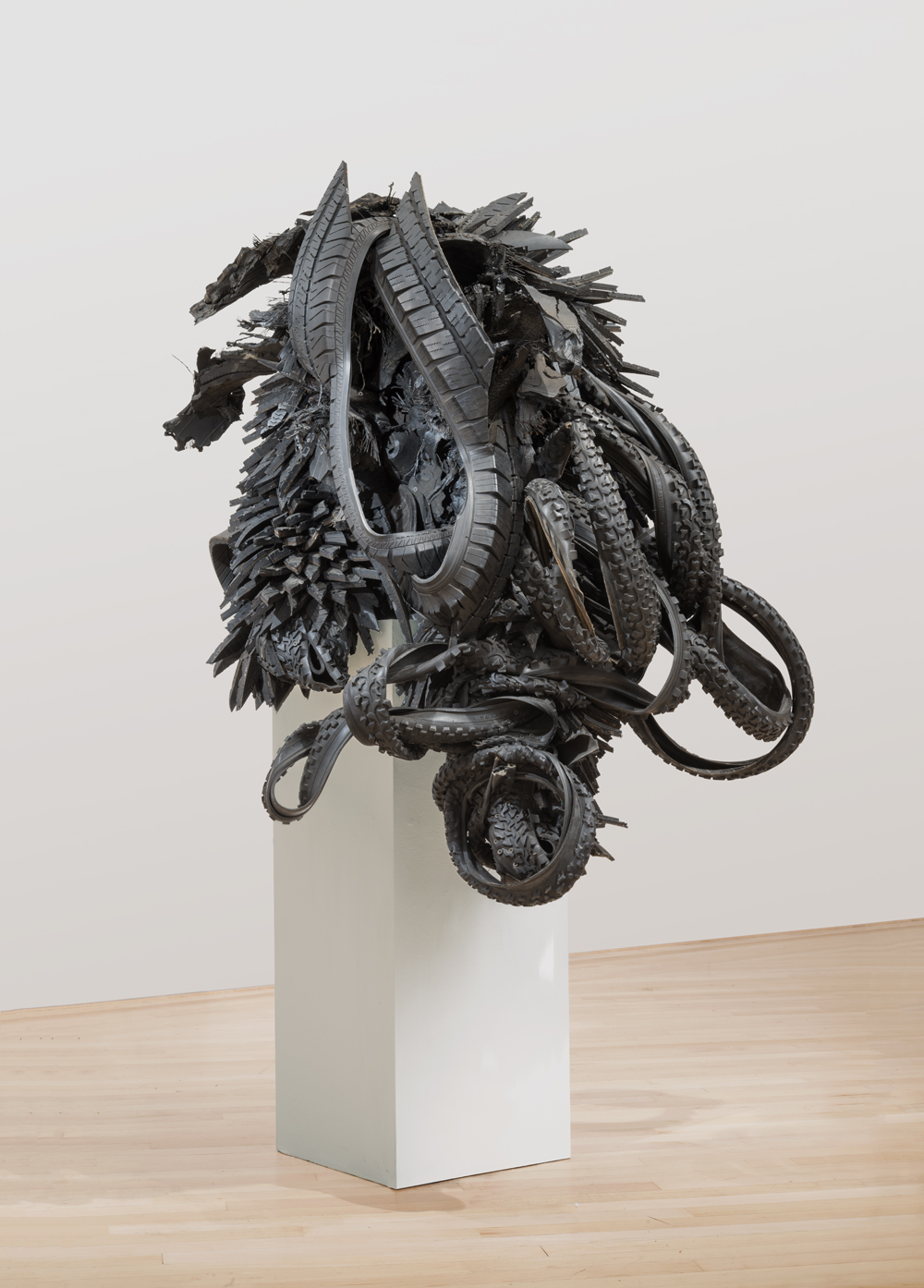 Chakaia Booker El Gato, 2001 rubber tire and wood , 48 x 42 x 42 inches Collection of the Kemper Museum of Contemporary Art, Bebe and Crosby Kemper Collection, Museum purchase, Enid and Crosby Kemper and William T. Kemper Acquisition Fund, 2004.12 © Chakaia Booker. Photo: E.G. Schempf