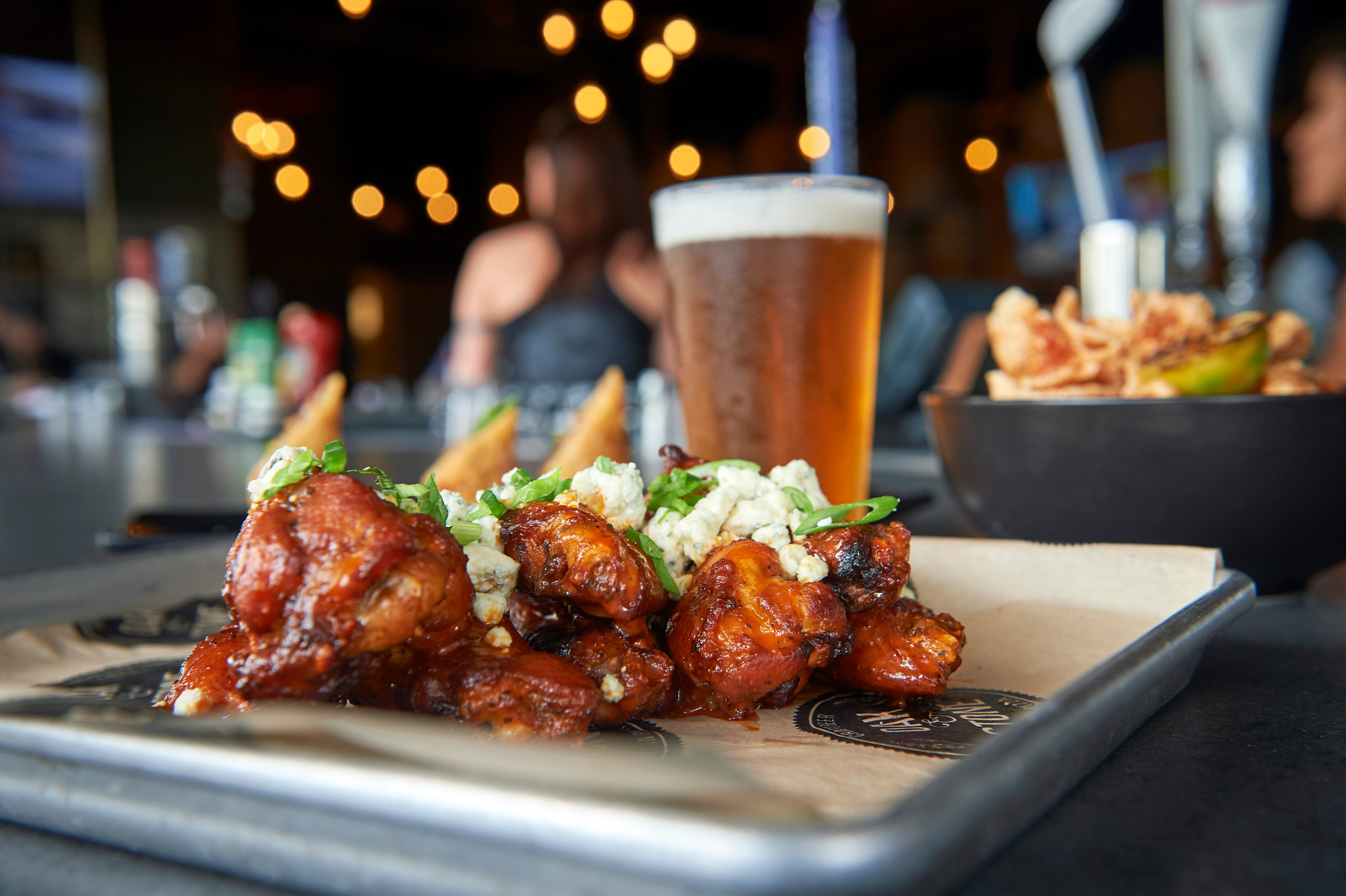 Beer and Wings. Photo courtesy of Oak & Stone.