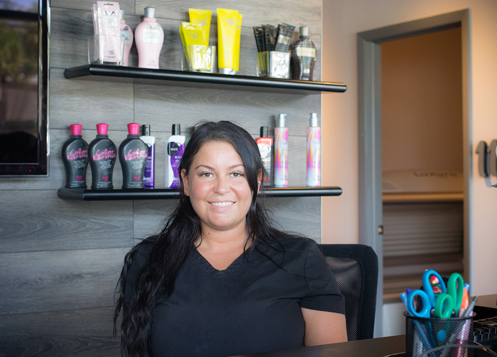 Chloe, Manager of Modern Tan Spa located at 3051 4th St N. Photo by Brooke DeMartino.