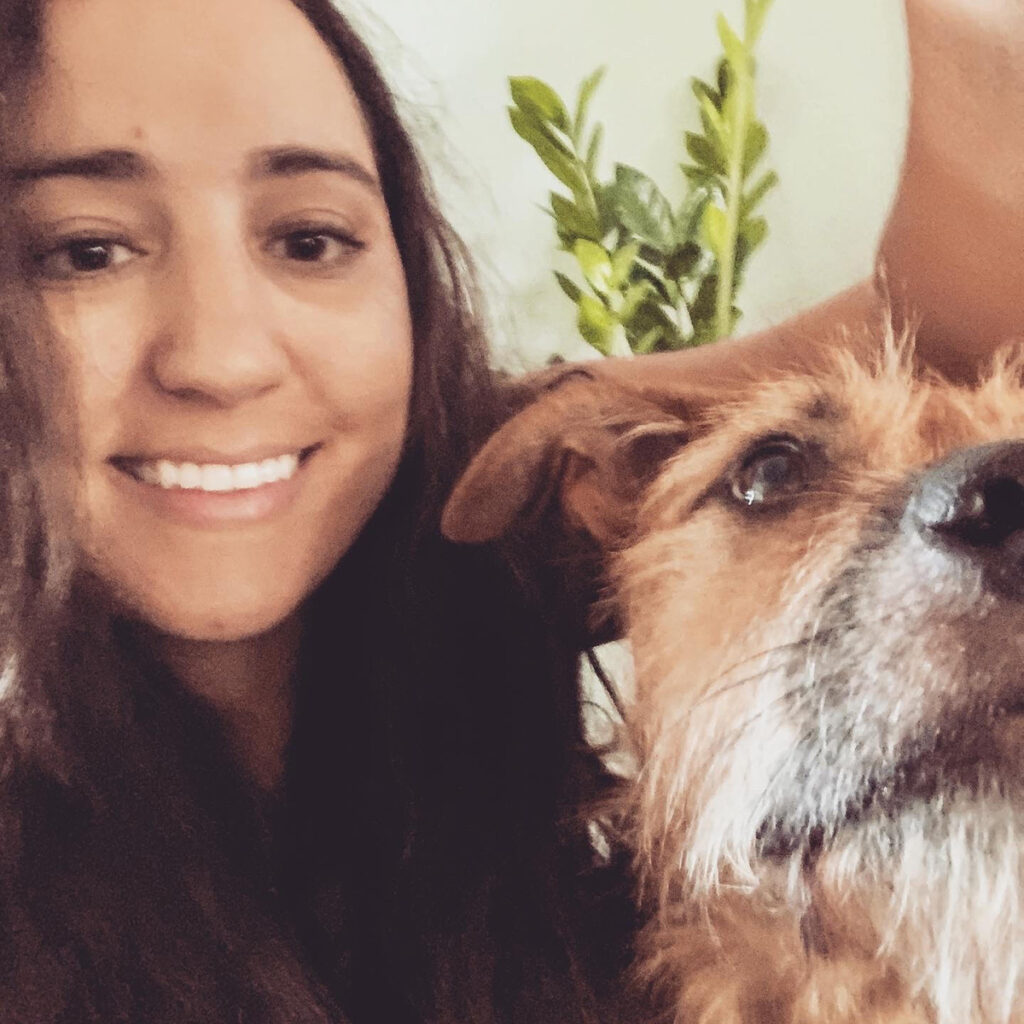 Madeline Mahon, founder and director of Promote Anti-Racism St. Pete, with her dog Triton
