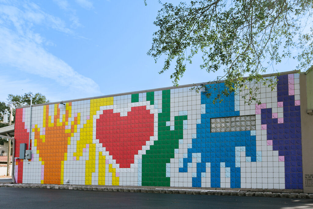 “Pride & Love” mural by Jay Hoff, Chad Mize, and LGBTQ youth volunteers from Metro Inclusive Health for the 2019 SHINE Mural Festival in celebration of Come Out St. Pete. Located in the Grand Central District at 2437 Central Ave. Photo by City of St. Petersburg