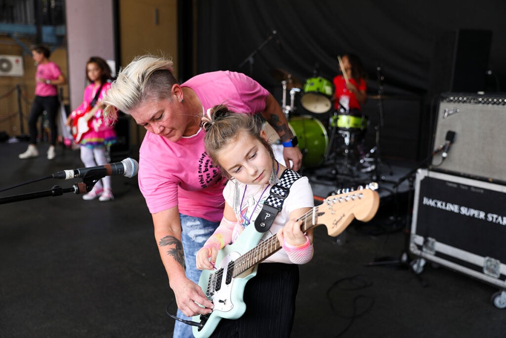Local celebrated musician Steph Callahan paves the way for pint-size players as part of Girls Rock’s leadership pipeline. Photo by Eve Edelheit