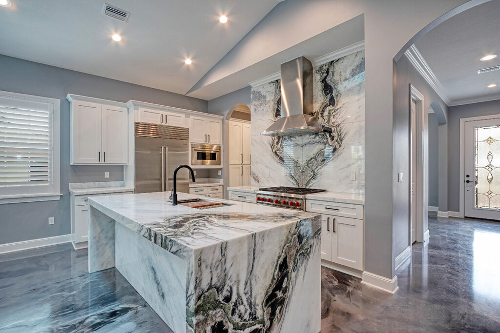 Book-matched Italian stone with a 3d epoxy floor. Photo courtesy of Tiger Construction