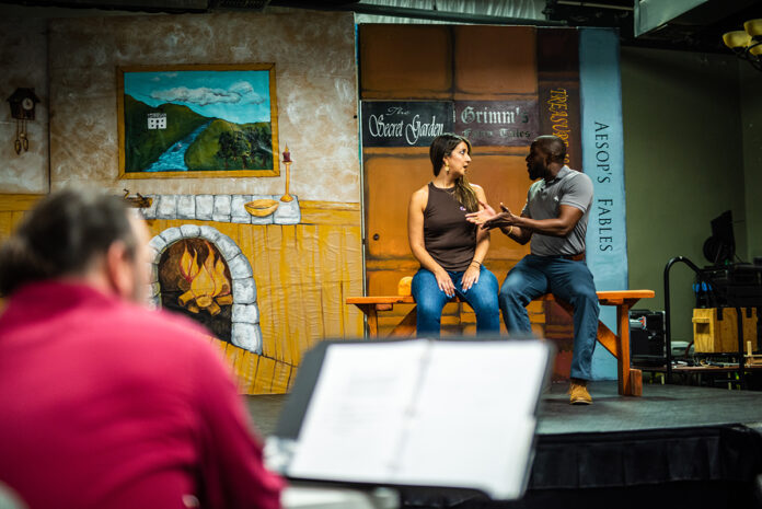 Dr. Sarah Klopfenstein (Pinocchio) and Kevin Mitchell, Jr. (Geppetto) rehearse for this year’s production for kids